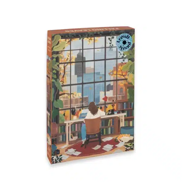 Puzzle Falling Leaves Trevell โ 500 piรจces, illustration dโune jeune fille assise ร son bureau รฉcrivant prรจs dโune fenรชtre avec vue sur la ville aux couleurs dโautomne.